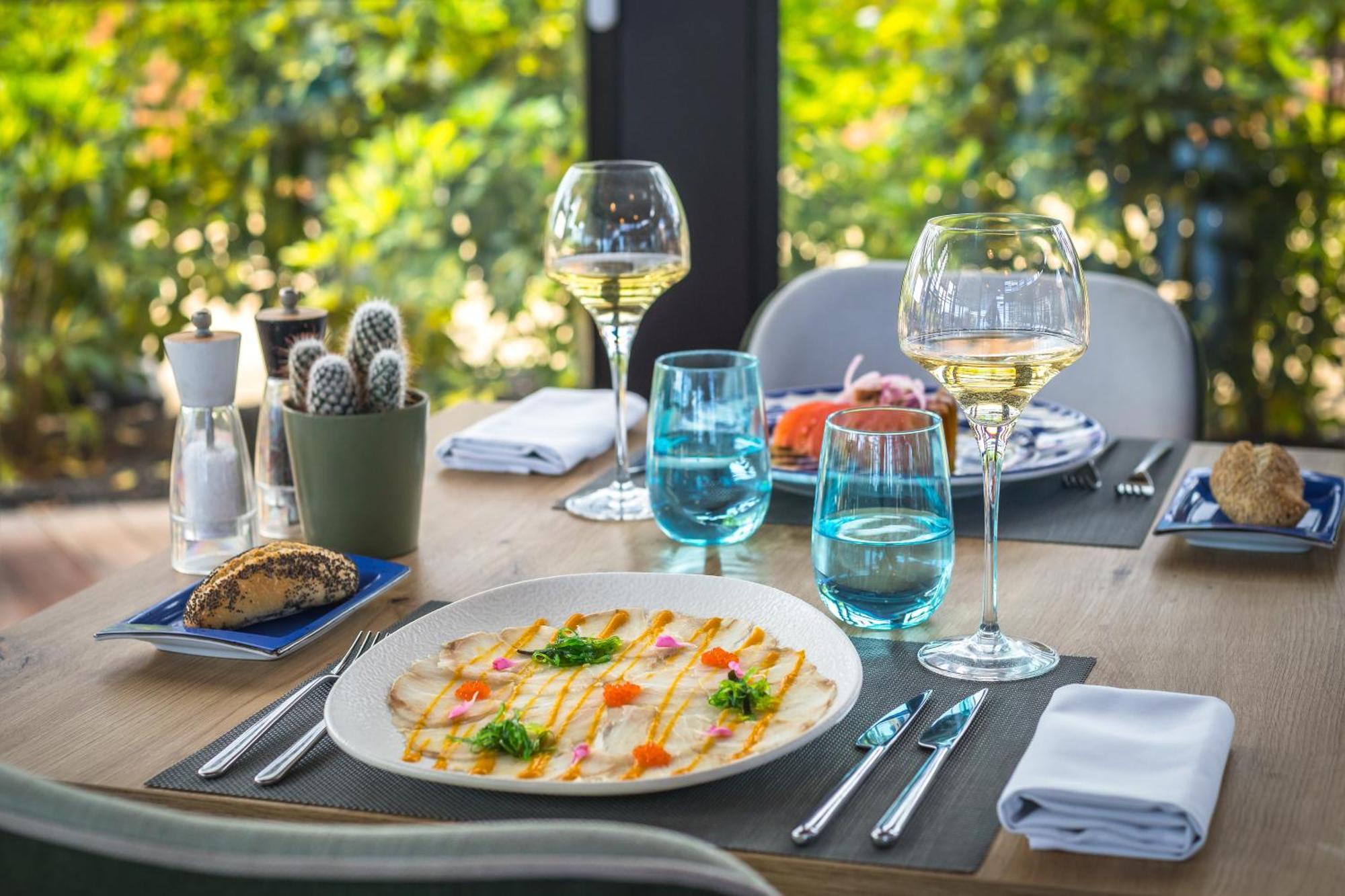 Barcelo Tenerife Golf Del Sur Esterno foto A table set for dinner