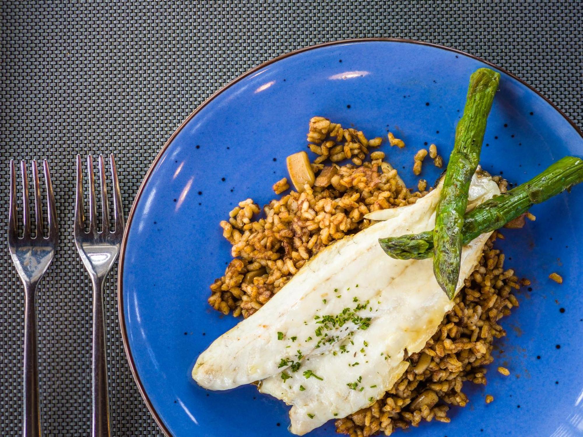 Barcelo Tenerife Golf Del Sur Esterno foto A plate of buckwheat with fish