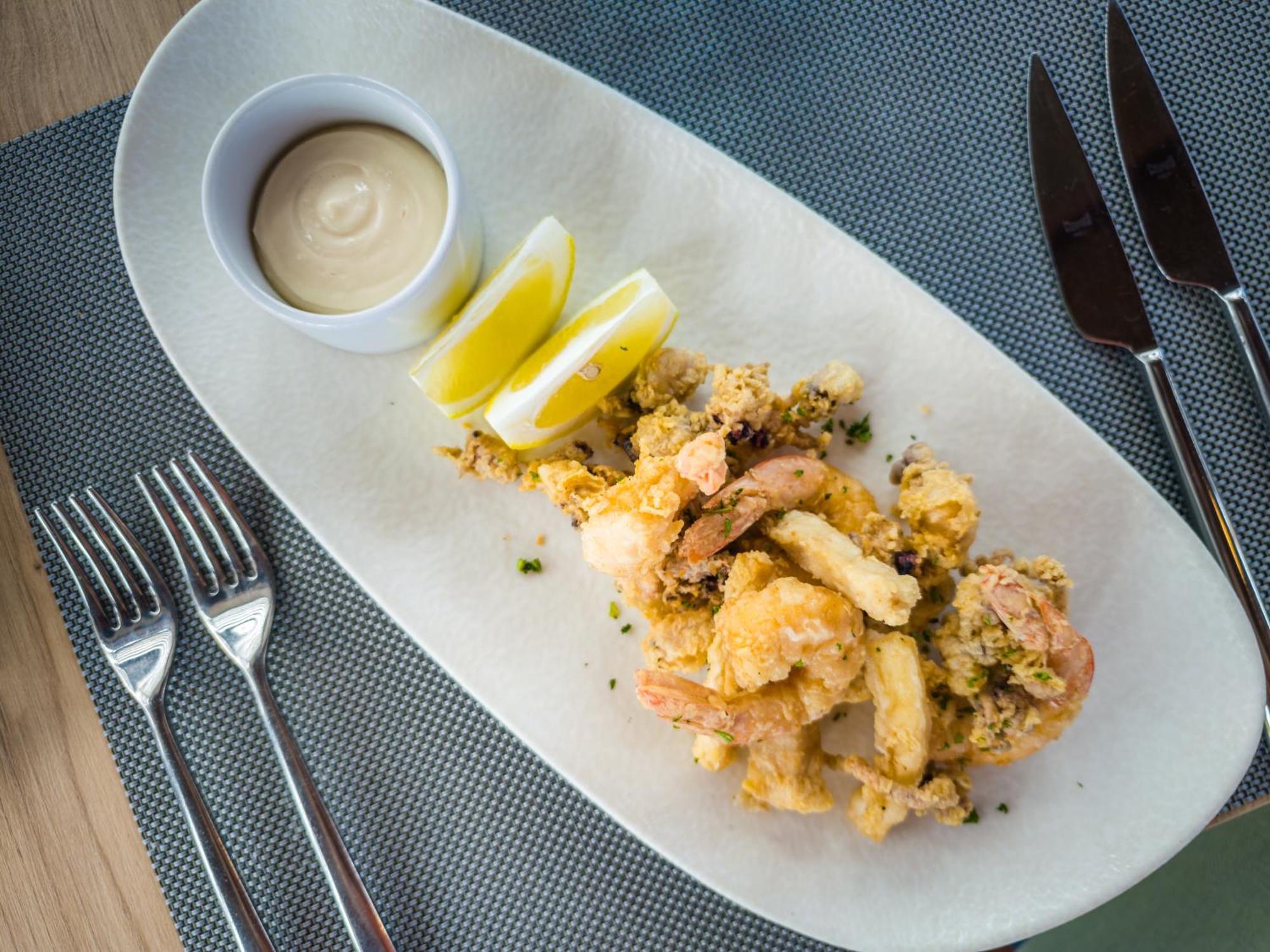 Barcelo Tenerife Golf Del Sur Esterno foto A plate of calamari